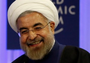 Iran's President Rouhani smiles during session of World Economic Forum in Davos