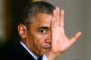 Obama waves as he departs the National Teacher of the Year ceremony in the East Room of the White House in Washington