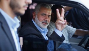 Senior Hamas leader Ismail Haniyeh gestures as leaves his office as a former Hamas government Prime Minister, in Gaza City
