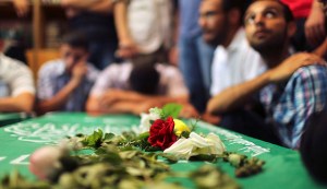 Mourners surround the bodies of Palestinian members of Hamas' armed wing during their funeral at a mosque in Gaza City