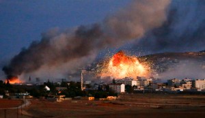 Smoke and flames rise over Syrian town of Kobani after an airstrike