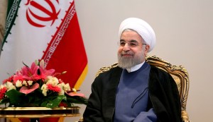 Iranian President Hassan Rouhani smiles during a meeting with German Economy and Energy Minister Sigmar Gabriel (unseen) in Tehran on July 20, 2015. Gabriel flew to Iran, becoming the first top Western official to visit the country since world powers and Tehran reached a historic nuclear deal. AFP PHOTO / ATTA KENARE (Photo credit should read ATTA KENARE/AFP/Getty Images)