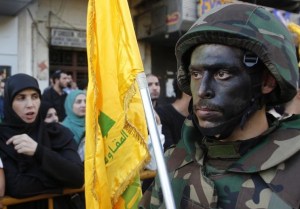 Lebanese Hezbollah supporters march during a religious procession, to mark the burning of the tents that is part of the Ashura religious ceremony, in Nabatieh