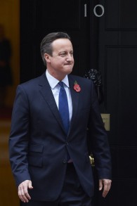 British Prime Minister David Cameron is pictured outside 10 Downing Street in London on November 3, 2015, as he waits to greet President Nursultan Nazarbayev of Kazakhstan. (AFP PHOTO / NIKLAS HALLE'N)