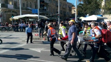 Police and medics at the scene of a shooting attack outside the Damascus Gate of Jerusalem's Old City on Wednesday, February 3, 2016 (Magen David Adom)