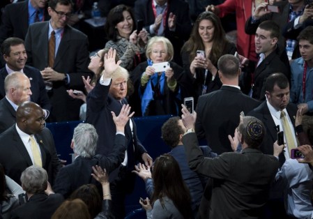 US Republican presidential hopeful Donald Trump waves at the American Israel Public Affairs Committee (AIPAC) 2016 Policy Conference at the Verizon Center in Washington, DC, March 21, 2016. / AFP / SAUL LOEB