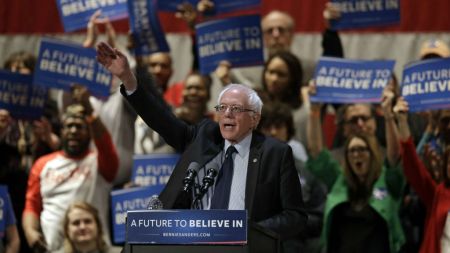 Democratic presidential candidate Sen. Bernie Sanders, I-Vermont, waves after speaking at a campaign rally at the Akron Civic Theatre in Akron, Ohio, Monday, March 14, 2016. (AP Photo/Tony Dejak)
