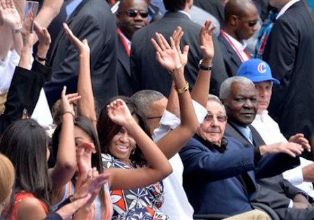 U.S. President Barack Obama with the First Family and Cuban President Raul Castro make the wave during a baseball game on March 22, 2016 in Havana, Cuba. Mr. Obama, who is on a 48 hour trip to Cuba, is the first sitting U.S. President to visit Cuba in almost 90 years.Photo by Olivier Douliery/Sipa USA