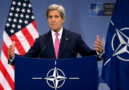 U.S. Secretary of State John Kerry speaks during a media conference at NATO headquarters in Brussels on Thursday, May 19, 2016. NATO foreign ministers this week will discuss how the alliance can deal more effectively with security threats outside Europe, including by training the Iraqi military and cooperating with the European Union to choke off people-smuggling operations in the central Mediterranean. (AP Photo/Virginia Mayo)