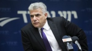 Yesh Atid party chairman, Yair Lapid, speaks during a faction meeting at the Knesset, June 27, 2016. (Yonatan Sindel/Flash90)