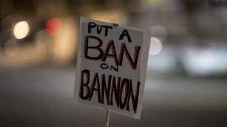 A protest sign is held in the air at a protest against the appointment of white nationalist alt-right media mogul, former Breitbart News head Stephen Bannon, to be chief strategist of the White House by president-elect Donald Trump, near City Hall in Los Angeles, November 16, 2016. (AFP/DAVID MCNEW)