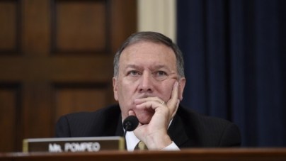 Republican Representative Mike Pompeo of Kansas listens as former US secretary of state Hillary Clinton testifies before the House Select Committee on Benghazi on Capitol Hill in Washington, DC on  on October 22, 2015. (AFP/Saul Loeb)
