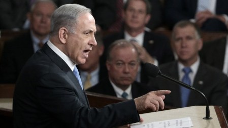 Prime Minister Benjamin Netanyahu addresses a joint meeting of the United States Congress in the House chamber at the US Capitol in Washington, DC on Tuesday, March 3, 2015, in a speech warning against the then-looming US-backed deal with Iran. (Win McNamee/Getty Images/AFP)