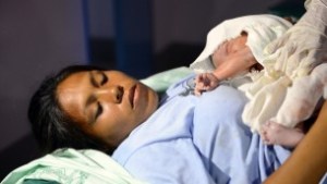 A woman shortly after giving birth at the IDF's field hospital in Bogo City, the Philippines. (Shay Wagner/IDF Spokesperson's Unit)