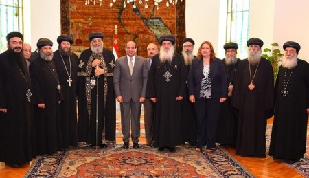 Egyptian President Abdel Fattah al-Sisi attends a meeting with Egyptian Coptic Pope Tawadros II, head of the Egyptian Coptic Orthodox Church, with some members of the Holy Synod of the Coptic Orthodox Church at the Ittihadiya presidential palace in Cairo, Egypt July 28, 2016 in this handout picture courtesy of the Egyptian Presidency. The Egyptian Presidency/Handout via REUTERS ATTENTION EDITORS - THIS IMAGE WAS PROVIDED BY A THIRD PARTY. EDITORIAL USE ONLY. - RTSK39U