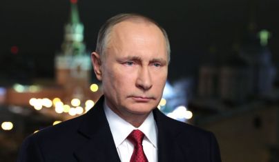 In this photo released by the Kremlin Press service via Sputnik agency, Saturday, Dec. 31, 2016, Russian President Vladimir Putin speaks during an undated recording of his annual televised New Year's message in the Kremlin in Moscow, Russia, . President Vladimir Putin invoked a bit of seasonal enchantment in his New Year's Eve remarks to the nation. The recorded message was being televised just before midnight Saturday in each of Russia's nine time zones. (Mikhail Klimentyev/Kremlin Press Service, Sputnik, via AP)