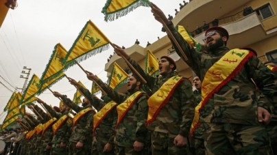 Fighters of the Shiite Hezbollah terror group attend the funeral of a comrade who died in combat in Syria in the southern Lebanese town of Kfar Hatta on March 18, 2017. (AFP Photo/Mahmoud Zayyat)