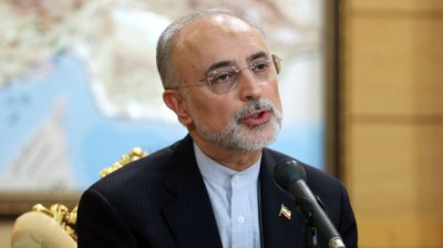 Head of Iran's Atomic Energy Organization Ali Akbar Salehi, who is also a member of Iran's nuclear negotiating team, speaks with journalists upon his arrival to Mehrabad Airport in Tehran, Iran, Wednesday, July 15, 2015 (AP/Ebrahim Noroozi)