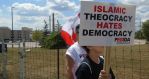 Islamic-theocracy-hates-democracy-sign-Photo-CIJnews