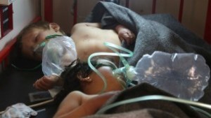 Syrian children receive treatment following a suspected toxic gas attack in Khan Sheikhun, a rebel-held town in the northwestern Syrian Idlib province, on April 4, 2017. (AFP PHOTO / Mohamed al-Bakour)