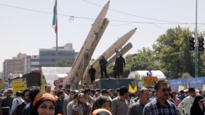 Zolfaghar missiles, right, are displayed during a rally marking al-Quds (Jerusalem) Day in Tehran on June 23, 2017. (AFP/Stringer)