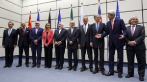 Participants in the talks on the Iran nuclear deal pose for a group photo at the UN building in Vienna, Austria, on July 14, 2015. (Carlos Barria, Pool Photo via AP)