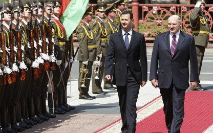 Belarus President Alexander Lukashenko, right, and his Syrian counterpart Bashar Assad are seen during a meeting in Minsk, Belarus, Monday, July 26, 2010. (AP/Nikolai Petrov, BelTA)