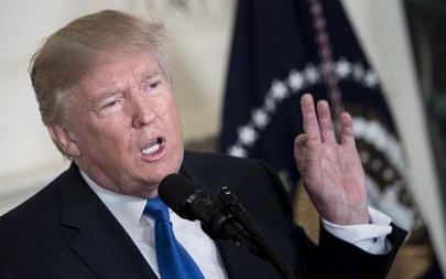 US President Donald Trump speaks about the Iran deal from the Diplomatic Reception room of the White House in Washington, DC, on October 13, 2017. (AFP PHOTO / Brendan SMIALOWSKI)