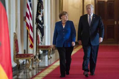 President Donald Trump arrives with German Chancellor Angela Merkel on Friday for a joint news conference in the East Room of the White House. Photo: Washington Post Photo By Jabin Botsford / The Washington Post