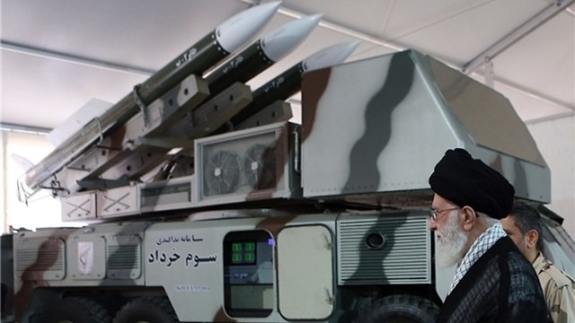 Supreme Leader Ayatollah Ali Khamenei examining the system