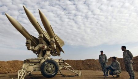 Iranian military prepare missiles to be launched. Iran claims its air defenses can challenge potential Israeli air strikes. Nov. 13, 2012