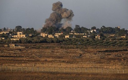 A picture taken from the Israeli Golan Heights shows a smoke plume rising during air strikes backing a Syrian-government-led offensive in the southwestern province of Daraa, July 23, 2018. (JALAA MAREY/AFP) A picture taken from the Israeli Golan Heights shows a smoke plume rising during air strikes backing a Syrian-government-led offensive in the southwestern province of Daraa, July 23, 2018. (JALAA MAREY/AFP)