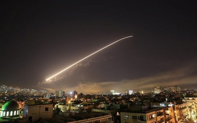 Illustrative - The Damascus sky lights up missile fire, as the US launches an attack on Syria targeting different parts of the capital, early Saturday, April 14, 2018. (AP Photo/Hassan Ammar)