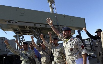 Iranian navy personnel celebrate after successfully launching a Ghader missile from the Jask port area on the shores of the Gulf of Oman during a drill near the Strait of Hormuz, Tuesday, January 1, 2013. (AP/Jamejam Online, Azin Haghighi) Iranian navy personnel celebrate after successfully launching a Ghader missile from the Jask port area on the shores of the Gulf of Oman during a drill near the Strait of Hormuz, Tuesday, January 1, 2013. (AP/Jamejam Online, Azin Haghighi)