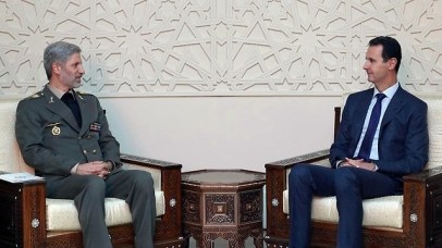 Syrian president Assad and Iranian Defense Minister Amir Khatami  (Photo: AP)