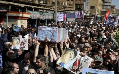 People attend a mass funeral for those who died in Saturday's attack on a military parade in the southwestern city of Ahvaz, that killed 25 people, in Ahvaz, Iran, Monday, Sept. 24, 2018 (AP Photo/Ebrahim Noroozi) People attend a mass funeral for those who died in Saturday's attack on a military parade in the southwestern city of Ahvaz, that killed 25 people, in Ahvaz, Iran, Monday, Sept. 24, 2018 (AP Photo/Ebrahim Noroozi)