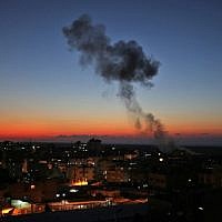Smoke billows following Israeli air strikes targeting Rafah in the southern Gaza Strip, near the border with Egypt, on November 12, 2018. (Photo by SAID KHATIB / AFP)