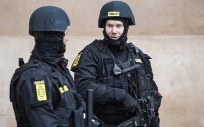 Illustrative: Danish policemen stand guard in front of the city court in Copenhagen, Denmark, on March 10, 2016. (AFP/SCANPIX DENMARK/Emil Hougaard)