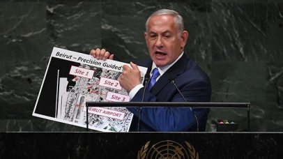 Netanyahu shows satellite images of precision missiles facility (Photo: AFP)