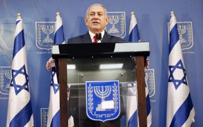 Israeli Prime Minister Benjamin Netanyahu delivers a statement in Tel Aviv, Israel, Sunday, Nov. 18, 2018. Netanyahu says he will take over temporarily as defense minister as early elections loom. (AP Photo/Ariel Schalit)