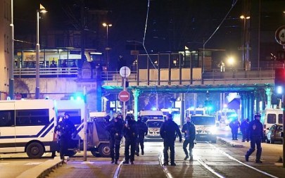French police officers block the road near the site where Cherif Chekatt, the alleged gunman who had been on the run since allegedly killing three people at Strasbourg's popular Christmas market, was shot dead by police in the Neudorf neighborhood of Strasbourg on December 13, 2018. (Alain JOCARD/AFP)