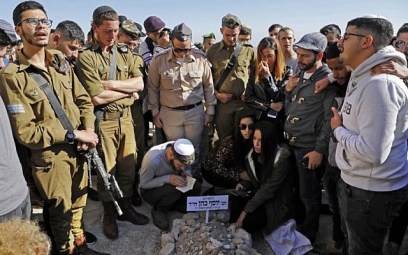 Friends and relatives of Sgt. Yosef Cohen mourn during his funeral in Jerusalem on December 14, 2018, a day after he was killed in a West Bank terror shooting. (Ahmad Gharabli/AFP)