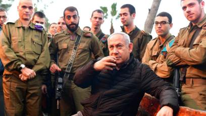 Prime Minister Benjamin Netanyahu visits Israeli forces stationed near Israel's border with Lebanon, December 11, 2018.