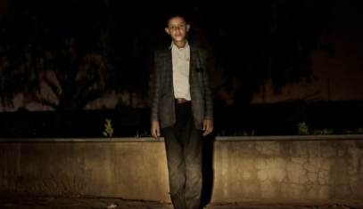 Riyadh, a 13-year-old former child soldier forced to enlist by Houthi rebels, poses for a photograph, in Marib, Yemen, July 28, 2018. He said he and his younger brother once shot and killed to enemy soldiers but most often, he closed his eyes tightly when he fired his rifle, terrified by combat. 