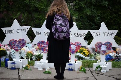 A person pays their respects at the memorial to the victims of the Pittsburgh synagogue attack (Photo:AFP) (Photo: AFP)