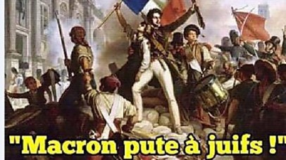  "Macron -whore of the Jews"