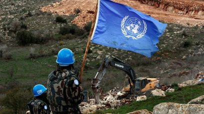 UN peacekeepers observe Israeli excavators working near the southern village of Mays al-Jabal    (Photo: AP)