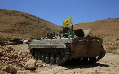 A Hezbollah armored vehicle sits at the site where clashes erupted between Hezbollah and al-Qaeda-linked fighters in Wadi al-Kheil or al-Kheil Valley in the Lebanon-Syria border, July 29, 2017. (AP Photo/Bilal Hussein) A Hezbollah armored vehicle sits at the site where clashes erupted between Hezbollah and al-Qaeda-linked fighters in Wadi al-Kheil or al-Kheil Valley in the Lebanon-Syria border, July 29, 2017. (AP Photo/Bilal Hussein)