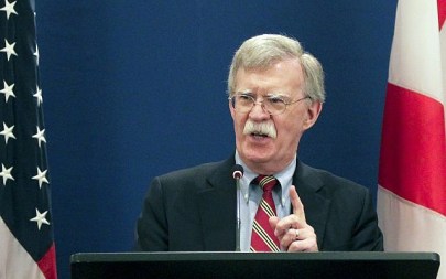 US National security adviser John Bolton gestures while speaking to the media during a news briefing following his meetings with Georgian officials in Tbilisi, Georgia, October 26, 2018. (Shakh Aivazov/AP)