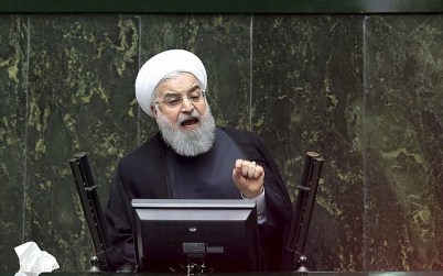 Iranian President Hassan Rouhani speaks during parliament's open session on confidence vote for four new ministers, in Tehran, Iran, October 27, 2018. (Ebrahim Noroozi/AP)